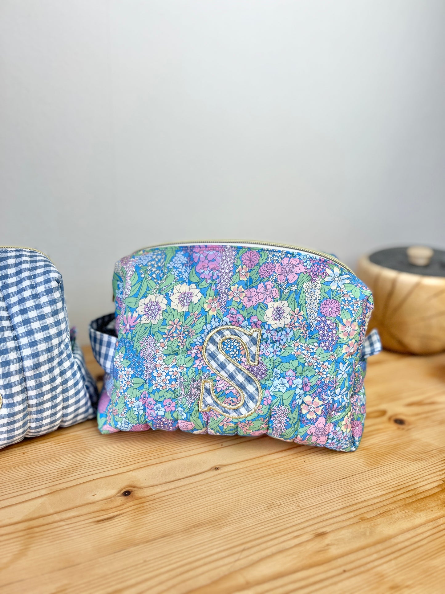 Couples set: duo of toiletry bags with initial