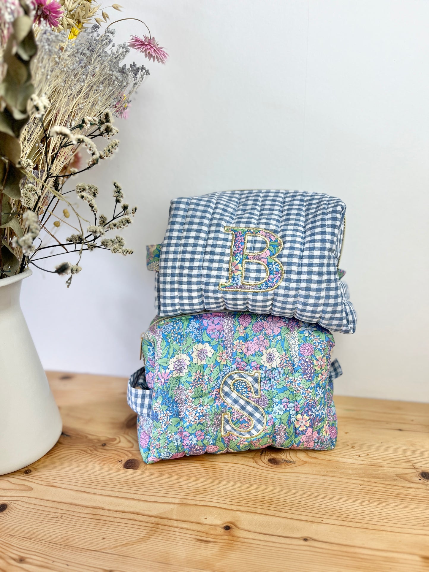 Couples set: duo of toiletry bags with initial