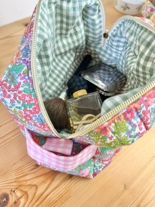 Colette's quilted toiletry bag and its bow