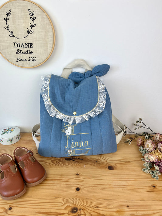 Le sac à dos Églantine gaze indigo et tulle fleuri doré