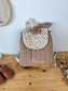 The Eglantine camel velvet backpack and Marion