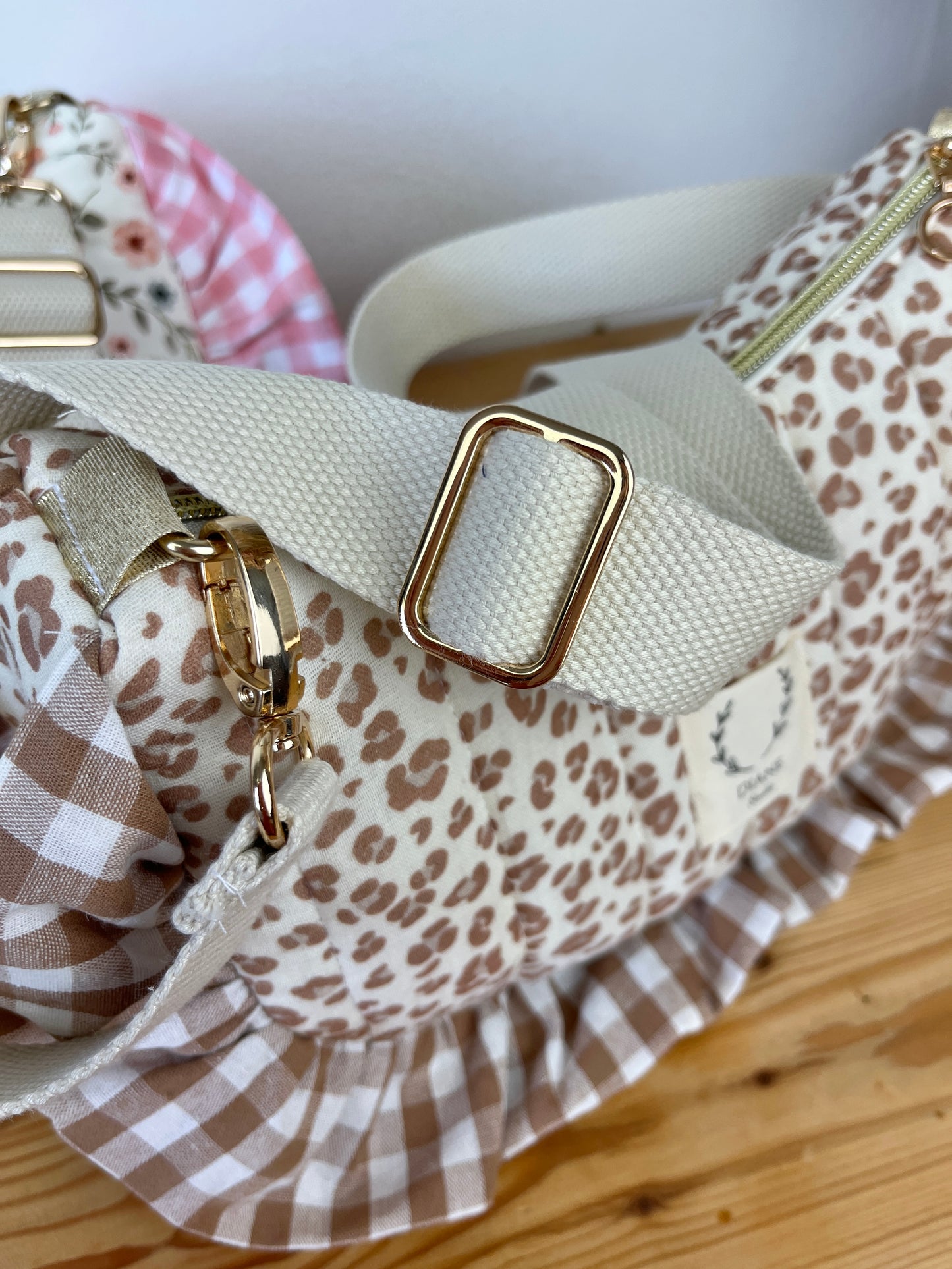 Milan the croissant bag with pink and gingham patterns