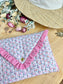 Charlotte quilted clutch bag in double floral gauze