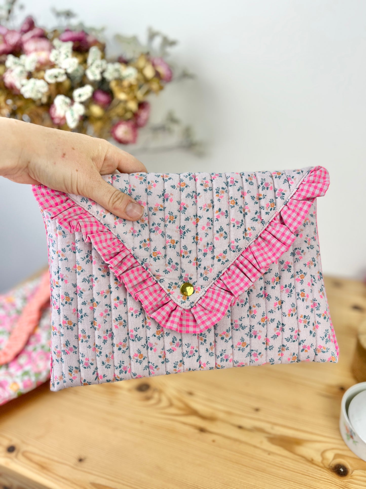 Charlotte quilted clutch bag in double floral gauze