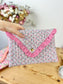Charlotte quilted clutch bag in double floral gauze