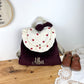 Le sac à dos Églantine gaze coeurs rouges et velours cerise