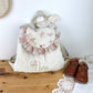 Le sac à dos Églantine jacquard roses pailleté gaze crème