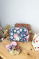 Set: toiletry bag and scrunchie of your choice 