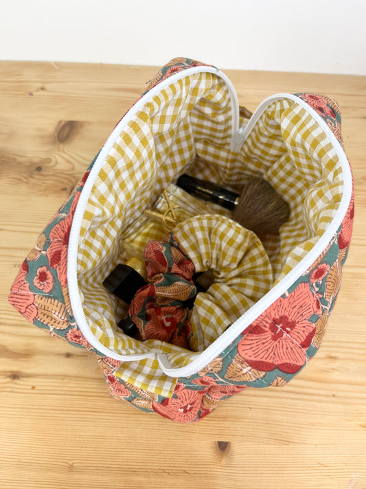 Colette Sahar toiletry bag and her scrunchie