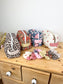 Set: toiletry bag and scrunchie of your choice 