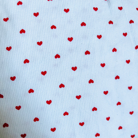 Cotton with small red hearts