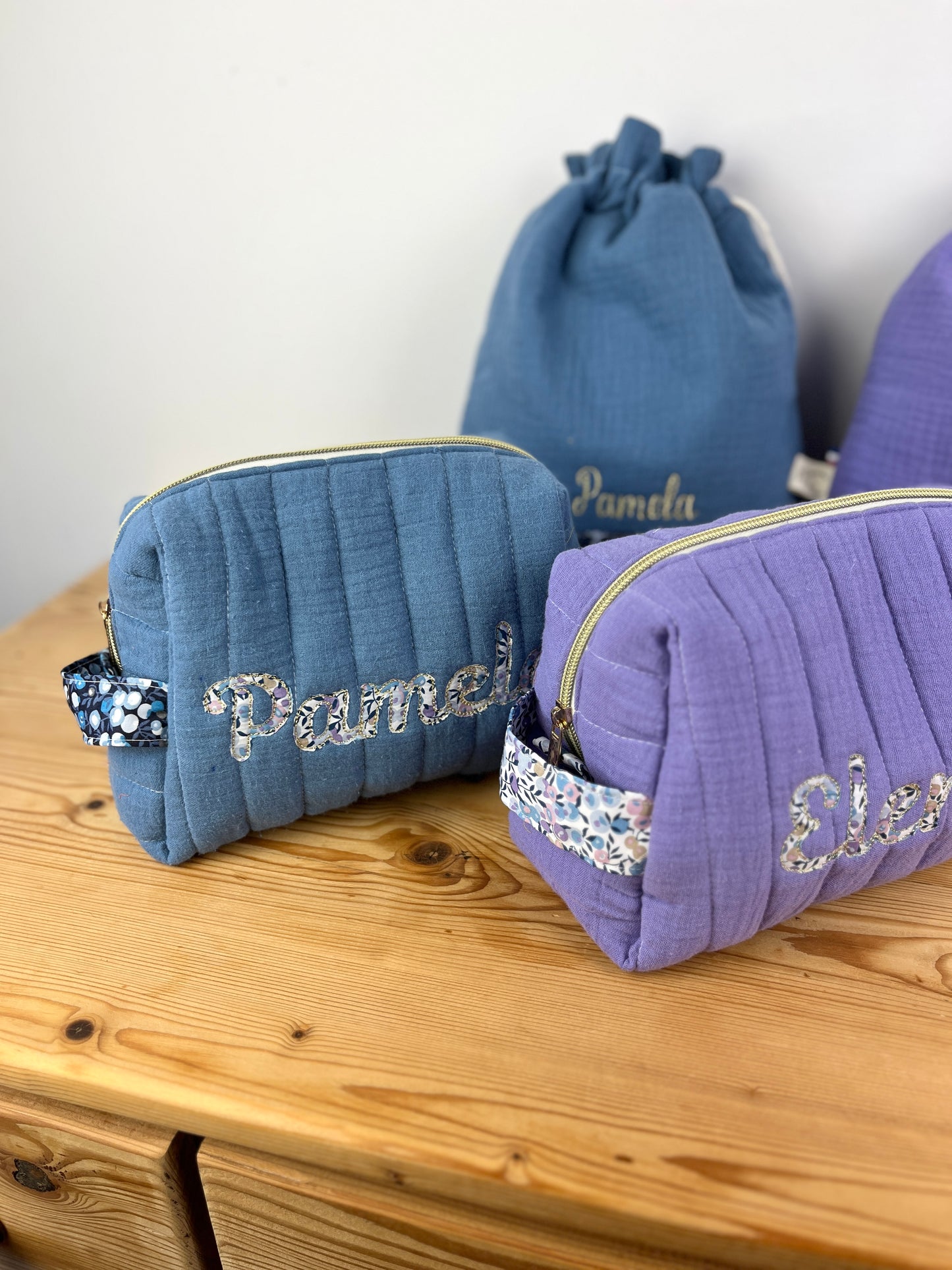 Set: toiletry bag and embroidered pouch 