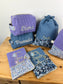 Set includes: toiletry bag, doll, notebook cover and embroidered pouch 