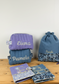 Set includes: toiletry bag, doll, notebook cover and embroidered pouch 