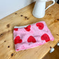 Children's neck warmer with red hearts