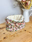 Children's pink garden party neck warmer
