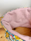 The pink glittery multicoloured children's neck warmer