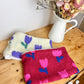 The children's sherpa neck warmer with tulip print