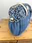 Set includes: Diaper bag, toiletry bag, doll, notebook cover, pouch and bonnet 
