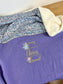 Set includes: Diaper bag, toiletry bag, blanket, doll, notebook cover, pouch and bonnet 