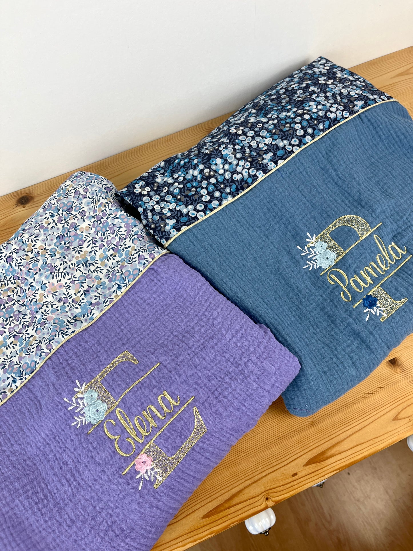 Set includes: Diaper bag, toiletry bag, blanket, doll, notebook cover, pouch and bonnet 