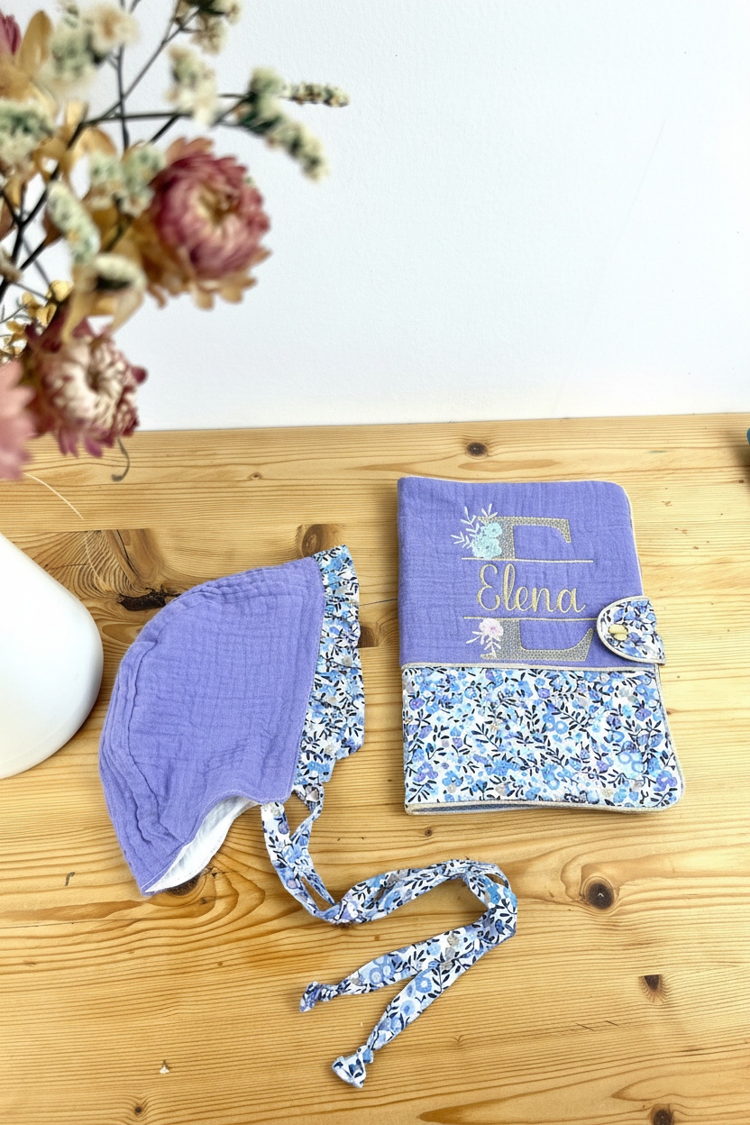 Set: baby bonnet and health record book cover 