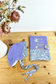 Set: baby bonnet and health record book cover 