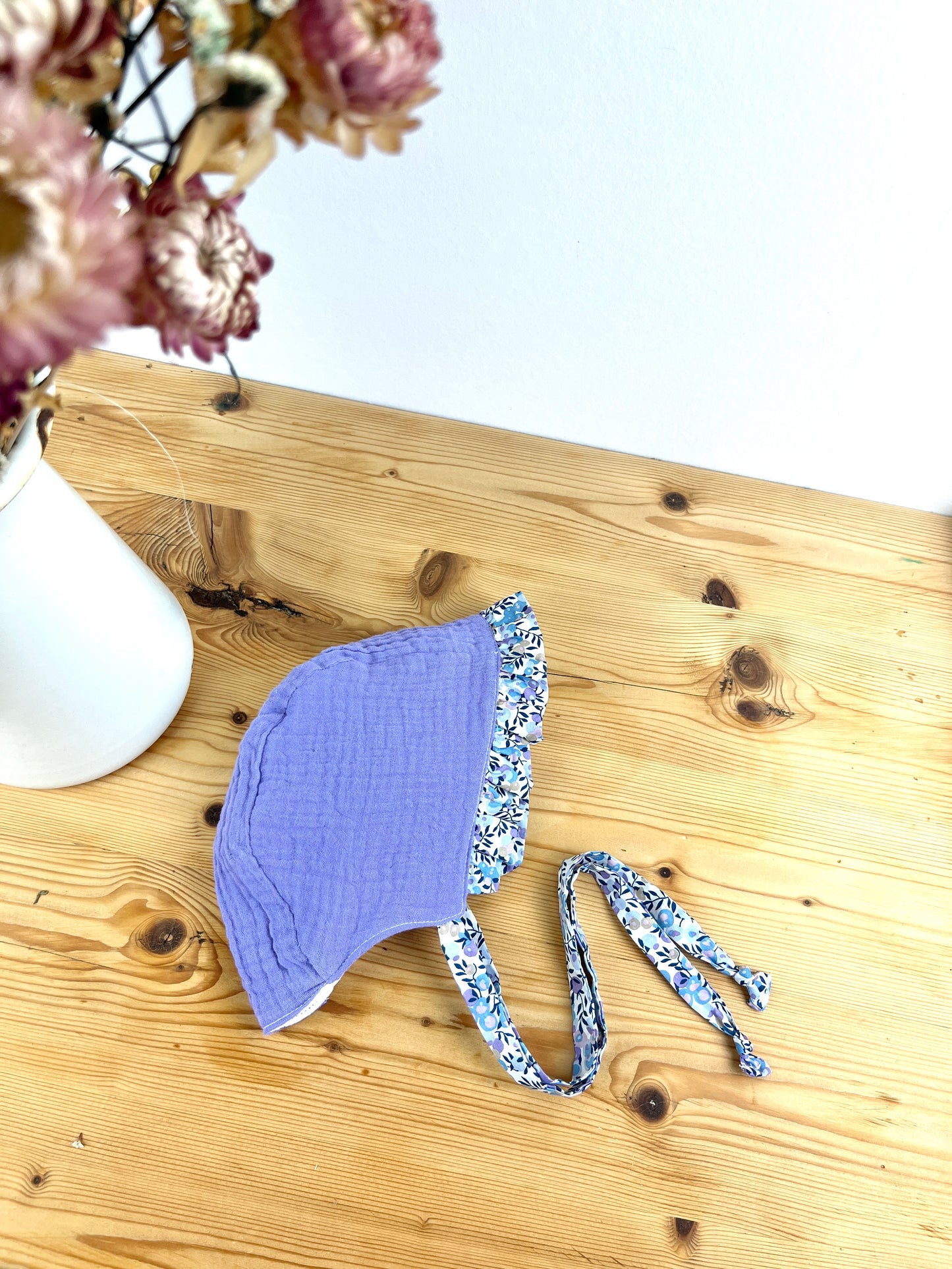 Set: baby bonnet and health record book cover 