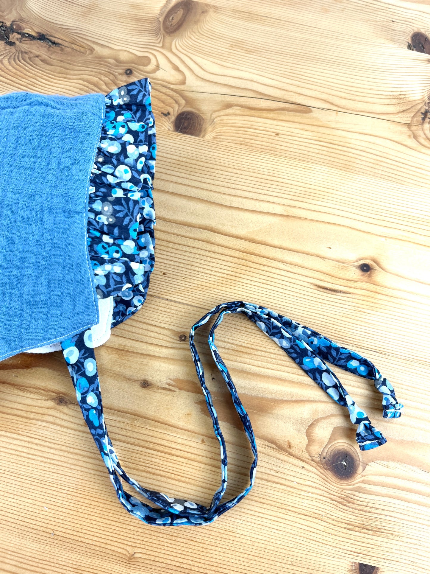 Set: baby bonnet and health record book cover 