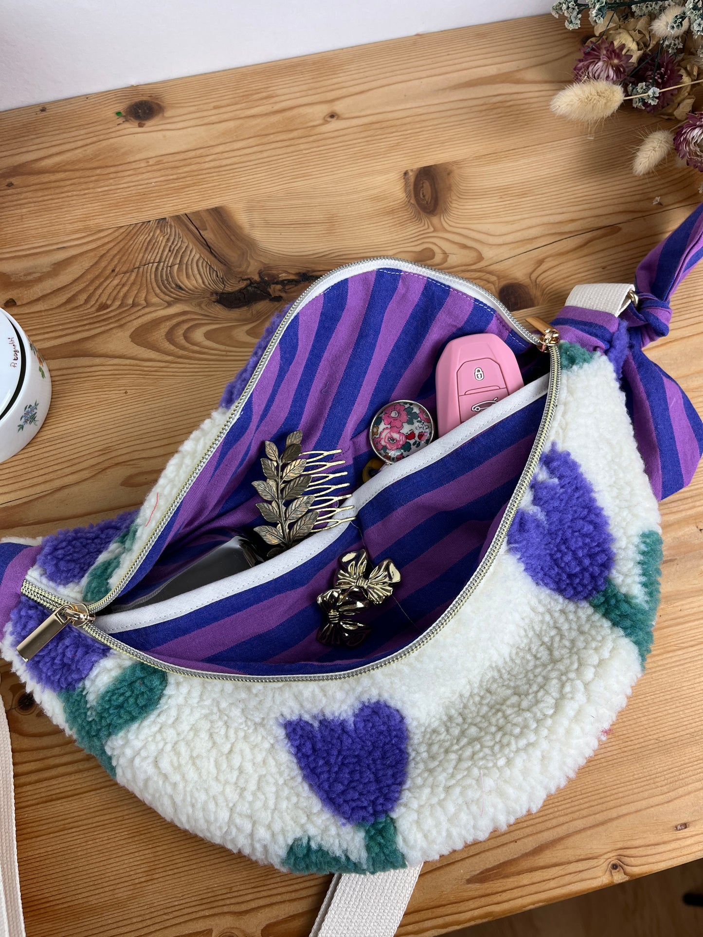 The Eléonore sherpa fanny pack in mauve tulips