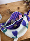 The Eléonore sherpa fanny pack in mauve tulips