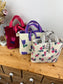 Félicie floral sherpa bag