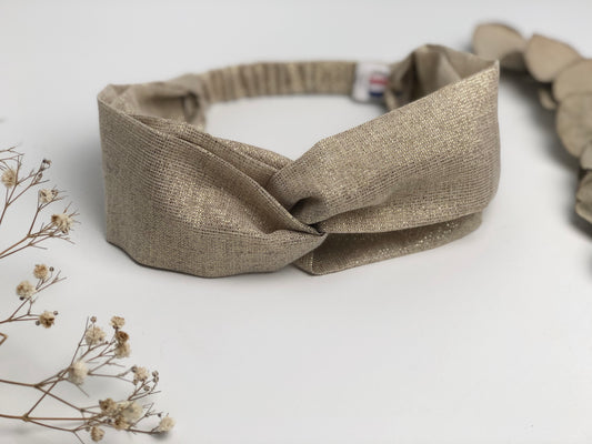 Headband croisé pailleté doré