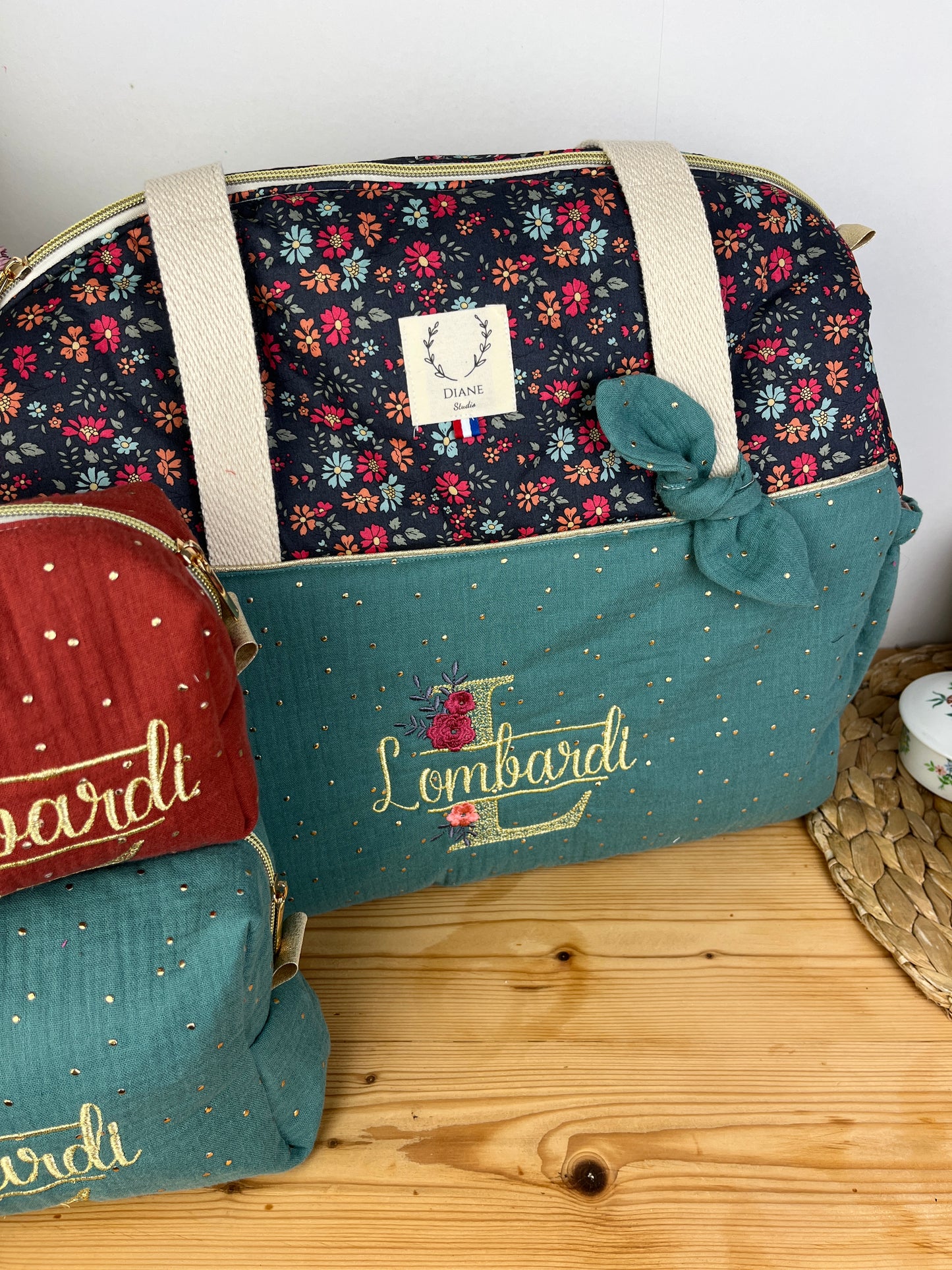 Set includes: diaper bag, toiletry bag, and beauty bag 
