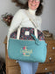 Set includes: diaper bag, toiletry bag, and beauty bag 