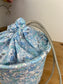The Aëlis drawstring basket is 100% customizable.