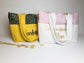 The large Adelaide tote bag is 100% customizable.