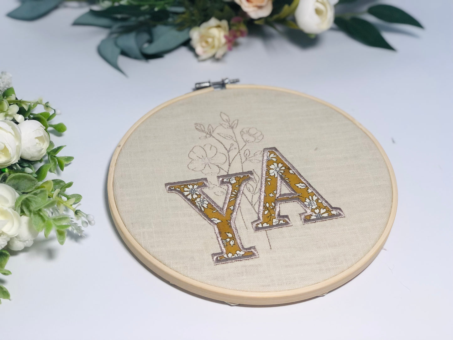 Le tambour initiale et fleur